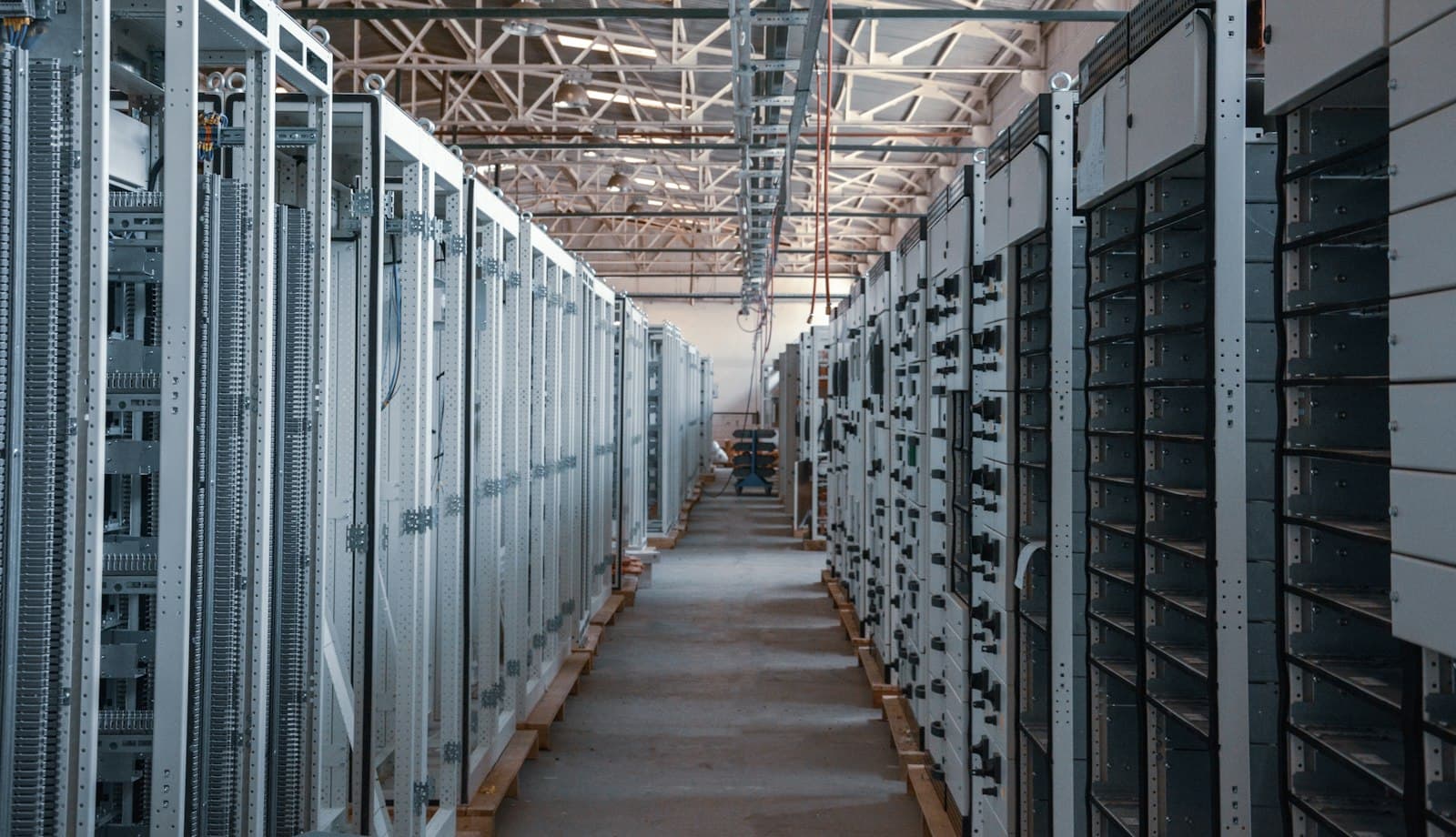 Rows of server racks in a converted industrial building
